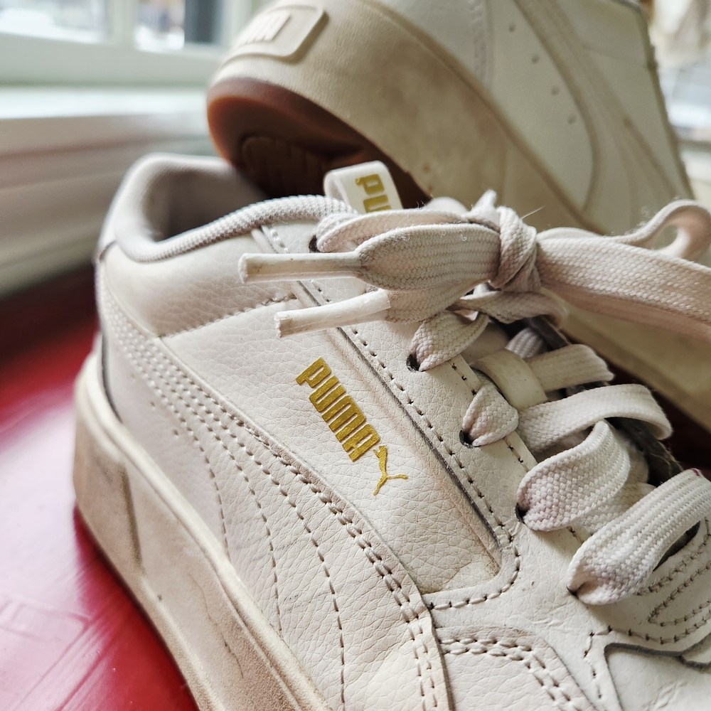 PUMA White Sneakers with Gold Logo